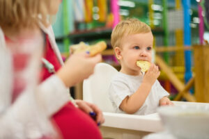 child eating in nursery nursery in Govan